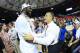 Mar 16, 2014; Atlanta, GA, USA; Florida Gators center Patric Young (4) and head coach Billy Donovan celebrate defeating the Kentucky Wildcats in the championship game for the SEC college basketball tournament at Georgia Dome. Florida won 61-60. Mandatory Credit: Paul Abell-USA TODAY Sports