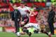MANCHESTER, ENGLAND - MARCH 16: Jon Flanagan of Liverpool competes with Juan Mata of Manchester United during the Barclays Premier League match between Manchester United and Liverpool at Old Trafford on March 16, 2014 in Manchester, England. (Photo by Alex Livesey/Getty Images)