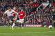 Liverpool's Steven Gerrard, right, fails to score his third penalty against Manchester United during their English Premier League soccer match at Old Trafford Stadium, Manchester, England, Sunday March 16, 2014. (AP Photo/Jon Super)