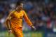 Real Madrid's Cristiano Ronaldo celebrates scoring the opening goal during a Spanish La Liga soccer match at La Rosaleda stadium in Malaga, Spain, Saturday March 15, 2014. (AP Photo/Daniel Tejedor)