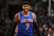 BOSTON, MA - MARCH 12: Carmelo Anthony #7 of the New York Knicks smliles during the game against the Boston Celtics on March 12, 2014 at the TD Garden in Boston, Massachusetts. NOTE TO USER: User expressly acknowledges and agrees that, by downloading and or using this photograph, User is consenting to the terms and conditions of the Getty Images License Agreement. Mandatory Copyright Notice: Copyright 2014 NBAE (Photo by Brian Babineau/NBAE via Getty Images)