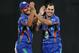 SHARJAH, UNITED ARAB EMIRATES - DECEMBER 08: Merwais Ashraf (L) and Mohammad Nabi Eisakhil (R) celebrate during the Twenty20 match between Afghanistan and Pakistan at the Sharjah Cricket Stadium on December 8, 2013 in Sharjah, United Arab Emirates. (Photo by Francois Nel/Getty Images)