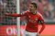 Benfica's Rodrigo celebrates after scoring the opening goal during their Portuguese league soccer match with Porto, at Benfica's Luz stadium in Lisbon, Sunday, Jan. 12 2014. (AP Photo/Armando Franca)