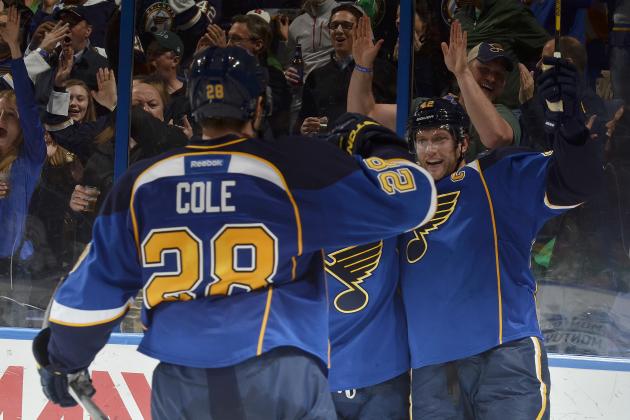 ST. LOUIS, MO - MARCH 17: David Backes #42 of the St. Louis Blues celebrates his goal with teammates during an NHL game against the Winnipeg Jets on March 17, 2014 at Scottrade Center in St. Louis, Missouri. (Photo by Mark Buckner/NHLI via Getty Images)