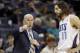 Charlotte Bobcats' head coach Steve Clifford makes a point with player Josh McRoberts (11) against the Atlanta Hawks during the first half of an NBA basketball game in Charlotte, N.C., Monday, March 17, 2014. (AP Photo/Bob Leverone)