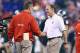 INDIANAPOLIS, IN - DECEMBER 07: Urban Meyer the head coach of the Ohio State Buckeyes and Mark Dantonio the head coach of the Michigan State Spartans talk before the Big Ten Championship at Lucas Oil Stadium on December 7, 2013 in Indianapolis, Indiana. (Photo by Andy Lyons/Getty Images)