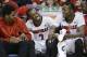 Louisville guard Russ Smith (2) laughs on the bench with Terry Rozier (0) during the final minutes of Louisville's 94-65 win over Houston in an NCAA college basketball game in the semifinals of the American Athletic Conference men's tournament Friday, March 14, 2014, in Memphis, Tenn. Smith led Louisville with 42 points. (AP Photo/Mark Humphrey)
