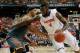 ATLANTA, GA - MARCH 15: Patric Young #4 of the Florida Gators drives with the ball against Jarnell Stokes #5 of the Tennessee Volunteers during the semifinals of the SEC Men's Basketball Tournament at Georgia Dome on March 15, 2014 in Atlanta, Georgia. (Photo by Kevin C. Cox/Getty Images)