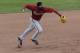 Arizona Diamondbacks shortstop Didi Gregorius throws out San Francisco Giants' Hunter Pence at first during the fifth inning of a spring training baseball game Sunday, March 2, 2014, in Scottsdale, Ariz. (AP Photo/Gregory Bull)