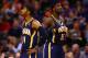 Jan 22, 2014; Phoenix, AZ, USA; Indiana Pacers forward Paul George (left) and center Roy Hibbert react in the second half against the Phoenix Suns at US Airways Center. The Suns defeated the Pacers 124-100. Mandatory Credit: Mark J. Rebilas-USA TODAY Sports