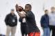 Louisville quarterback Teddy Bridgewater participates in a passing drill for NFL representatives during pro day at the University of Louisville in Louisville, Ky., Monday, March 17, 2014. (AP Photo/Timothy D. Easley)