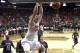 New Mexico's Cameron Bairstow dunks during the second half of an NCAA college basketball game against Fresno State in the quarterfinals of the Mountain West Conference tournament, Thursday, March 13, 2014, in Las Vegas. New Mexico defeated Fresno State 93-77. (AP Photo/Isaac Brekken)