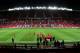 Olympiakos players gather on the pitch to train at Old Trafford Stadium, Manchester, England, Tuesday, March 18, 2014. Olympiakos will play Manchester United in a Champions League last 16 second leg soccer match on Wednesday. (AP Photo/Jon Super)