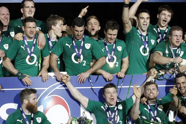 Ireland's rugby team players celebrate after defeating France and winning the Six Nations Rugby Union tournament at the stade de France stadium, in Saint Denis, outside Paris, Saturday, March 15, 2014. (AP Photo/Christophe Ena)