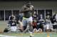 Notre Dame defensive lineman Louis Nix runs through a drill during Notre Dame's Pro Day for NFL football scouts Thursda, March 20, 2014, in South Bend, Ind. (AP Photo/Joe Raymond)
