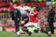 MANCHESTER, ENGLAND - MARCH 16: Jon Flanagan of Liverpool competes with Juan Mata of Manchester United during the Barclays Premier League match between Manchester United and Liverpool at Old Trafford on March 16, 2014 in Manchester, England. (Photo by Alex Livesey/Getty Images)
