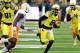 Oregon running back De'Anthony Thomas (6) runs with the ball as Tennessee defensive back Michael Williams (7) closes in during the first quarter of an NCAA college football game in Eugene, Ore., Saturday, Sept. 14, 2013. Oregon won 59-14. (AP Photo/Steve Dykes)