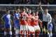 Arsenal's Kieran Gibbs, centre left, gets a red card during the English Premier League soccer match between Chelsea and Arsenal at Stamford Bridge stadium in London, Saturday, March 22, 2014. (AP Photo/Kirsty Wigglesworth)