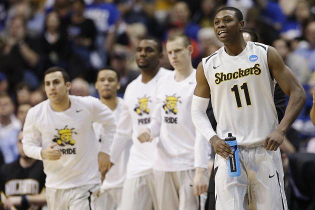 Wichita State forward Cleanthony Early (11) watches action against Cal Poly from the sideline during the second half of a second-round game in the NCAA college basketball tournament Friday, March 21, 2014, in St. Louis. (AP Photo/Charlie Riedel)