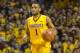 Feb 8, 2014; Minneapolis, MN, USA; Minnesota Golden Gophers guard Andre Hollins (1) dribbles the ball in the second half against the Indiana Hoosiers at Williams Arena. The Golden Gophers won 66-60. Mandatory Credit: Jesse Johnson-USA TODAY Sports