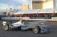 A new all-electric race car, the Spark-Renault SRT 01E Formula E, is taken on a demonstration drive by Brazilian Formula One driver Lucas di Grassi on the grounds of the Mandalay Bay hotel-casino in Las Vegas Monday, Jan. 6, 2013. Organizers of the FIA Formula E Championship, the first series exclusively for electric cars, are giving racing aficionados their first chance to see a fully-electric car in action. (AP Photo/Hannah Dreier)