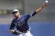Tampa Bay Rays starting pitcher David Price pitches in the second inning of an exhibition baseball game against the Boston Red Sox in Port Charlotte, Fla., Sunday, March 16, 2014. (AP Photo/Gerald Herbert)