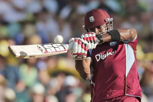 West Indies' batsman Kieron Pollard plays a shot during their One Day International Cricket match against Australia in Sydney, Australia, Friday, Feb. 8, 2013.(AP Photo/Rob Griffith)