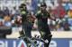 Pakistan's batsmen Umar Akmal, left, and Kamran Akmal run between the wickets to add runs during their ICC Twenty20 Cricket World Cup match against Australia in Dhaka, Bangladesh, Sunday, March 23, 2014. (AP Photo/Aijaz Rahi)