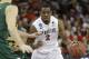 San Diego State's Xavier Thames drives against North Dakota State in the first half during the third round of the NCAA men's college basketball tournament in Spokane, Wash., Saturday, March 22, 2014. (AP Photo/Elaine Thompson)