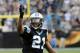Dec 22, 2013; Charlotte, NC, USA; Carolina Panthers safety Mike Mitchell (21) celebrates breaking up a pass by the New Orleans Saints during the second quarter of the game at Bank of America Stadium. Mandatory Credit: Sam Sharpe-USA TODAY Sports