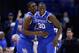 ST LOUIS, MO - MARCH 23: Julius Randle #30 of the Kentucky Wildcats celebrates with teammate Dakari Johnson #44 after defeating the Wichita State Shockers 78 to 76 during the third round of the 2014 NCAA Men's Basketball Tournament at Scottrade Center on March 23, 2014 in St Louis, Missouri. (Photo by Andy Lyons/Getty Images)