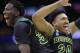 Baylor's Taurean Prince, left, and Ish Wainright, right, celebrate their win over Creighton in a third-round game in the NCAA college basketball tournament Sunday, March 23, 2014, in San Antonio. Baylor won 85-55. (AP Photo/David J. Phillip)