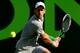 KEY BISCAYNE, FL - MARCH 21: Novak Djokovic of Serbia returns a shot to Jeremy Chardy of France during the Sony Open at the Crandon Park Tennis Center on March 21, 2014 in Key Biscayne, Florida. (Photo by Matthew Stockman/Getty Images)
