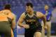 Texas A&M offensive lineman Jake Matthews runs a drill at the NFL football scouting combine in Indianapolis, Saturday, Feb. 22, 2014. (AP Photo/Michael Conroy)