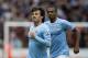 Manchester City's David Silva celebrates after scoring against Hull City during their English Premier League soccer match at the KC Stadium, Hull, England, Saturday March 15, 2014. (AP Photo/Jon Super)