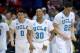 SAN DIEGO, CA - MARCH 23: Aubrey Williams #30 Nick Kazemi #0 and Noah Allen #22 of the UCLA Bruins celebrate their 77 to 60 win over the Stephen F. Austin Lumberjacks during the third round of the 2014 NCAA Men's Basketball Tournament at Viejas Arena on March 23, 2014 in San Diego, California. (Photo by Donald Miralle/Getty Images)