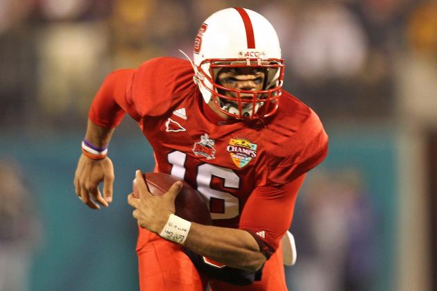 ORLANDO, FL - DECEMBER 28:  Russell Wilson #16 of the North Carolina State Wolfpack rushes with the ball during the Champs Sports Bowl against the West Virginia Mountineers at Florida Citrus Bowl Stadium on December 28, 2010 in Orlando, Florida.  (Photo by Mike Ehrmann/Getty Images)