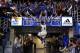 LAWRENCE, KS - FEBRUARY 24: Wayne Selden, Jr. #1 of the Kansas Jayhawks slaps the scoreboard and celebrates with fans after a 83-75 win over the Oklahoma Sooners at Allen Fieldhouse on February 24, 2014 in Lawrence, Kansas. (Photo by Ed Zurga/Getty Images)