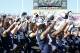 FORT WORTH, TX - DECEMBER 30: Players of the Navy Midshipmen celebrate after a game against the Middle Tennessee Blue Raiders during the Bell Helicopter Armed Forces Bowl at Amon G. Carter Stadium on December 30, 2013 in Fort Worth, Texas. The Navy Midshipmen defeated the Middle Tennessee Blue Raiders 24-6. (Photo by Sarah Glenn/Getty Images)