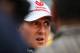 Mercedes driver Michael Schumacher of Germany talks to reporters after he failed to finish in the Indian Formula One Grand Prix at the Buddh International Circuit in Noida, on the outskirts of New Delhi, India, Sunday, Oct. 28, 2012. (AP Photo/Manish Swarup)