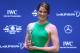 KUALA LUMPUR, MALAYSIA - MARCH 26: Laureus World Sportswoman of the Year winner Missy Franklin poses with her trophy during the Winners Photocall for the 2014 Laureus World Sports Awards at the Istana Budaya Theatre on March 26, 2014 in Kuala Lumpur, Malaysia. (Photo by Paul Gilham/Getty Images)