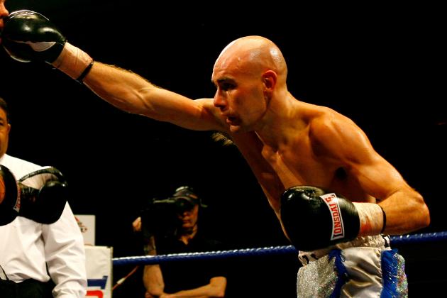 LONDON, ENGLAND - FEBRUARY 12:  Stuart Hall (R) lands a punch on Richard Szelebedi in their bout at York Hall on February 12, 2010 in London, England.  (Photo by Dean Mouhtaropoulos/Getty Images)