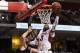 Feb 14, 2014; Philadelphia, PA, USA; Temple Owls forward Anthony Lee (3) shoots during the second half against the Louisville Cardinals at the Liacouras Center. Louisville defeated Temple 82-58. Mandatory Credit: Howard Smith-USA TODAY Sports