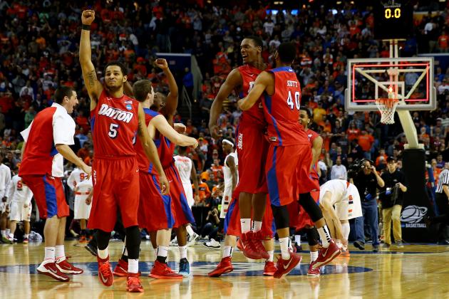BUFFALO, NY - MARCH 22: Devin Oliver #5 of the Dayton Flyers reacts after defeating the Syracuse Orange 55-53 in the third round of the 2014 NCAA Men's Basketball Tournament at the First Niagara Center on March 22, 2014 in Buffalo, New York. (Photo by Elsa/Getty Images)