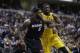 Miami Heat forward LeBron James, left, and Indiana Pacers center Roy Hibbert battle for position on a free throw in the second half of an NBA basketball game in Indianapolis, Tuesday, Dec. 10, 2013. The Pacers defeated the Heat 90-84. (AP Photo/Michael Conroy)