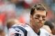 HOUSTON, TX - DECEMBER 01: Tom Brady #12 of the New England Patriots waits near the bench during the first half of the game against the Houston Texans at Reliant Stadium on December 1, 2013 in Houston, Texas. (Photo by Scott Halleran/Getty Images)
