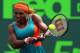 KEY BISCAYNE, FL - MARCH 27: Serena Williams returns a shot to Maria Sharapova of Russia during their match on Day 11 of the Sony Open at the Crandon Park Tennis Center on March 27, 2014 in Key Biscayne, Florida. (Photo by Mike Ehrmann/Getty Images)