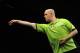 Michael van Gerwen has surged ahead after beating closest rival Peter Wright.