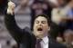 Arizona head coach Sean Miller gestures to his team as they play Gonzaga during the first half of a third-round game in the NCAA college basketball tournament Sunday, March 23, 2014, in San Diego. (AP Photo/Lenny Ignelzi)