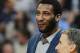 Detroit Pistons center Andre Drummond looks on from bench as the Pistons face the Denver Nuggets in the third quarter of the Nuggets' 118-109 victory in an NBA basketball game in Denver on Wednesday, March 19, 2014. (AP Photo/David Zalubowski)